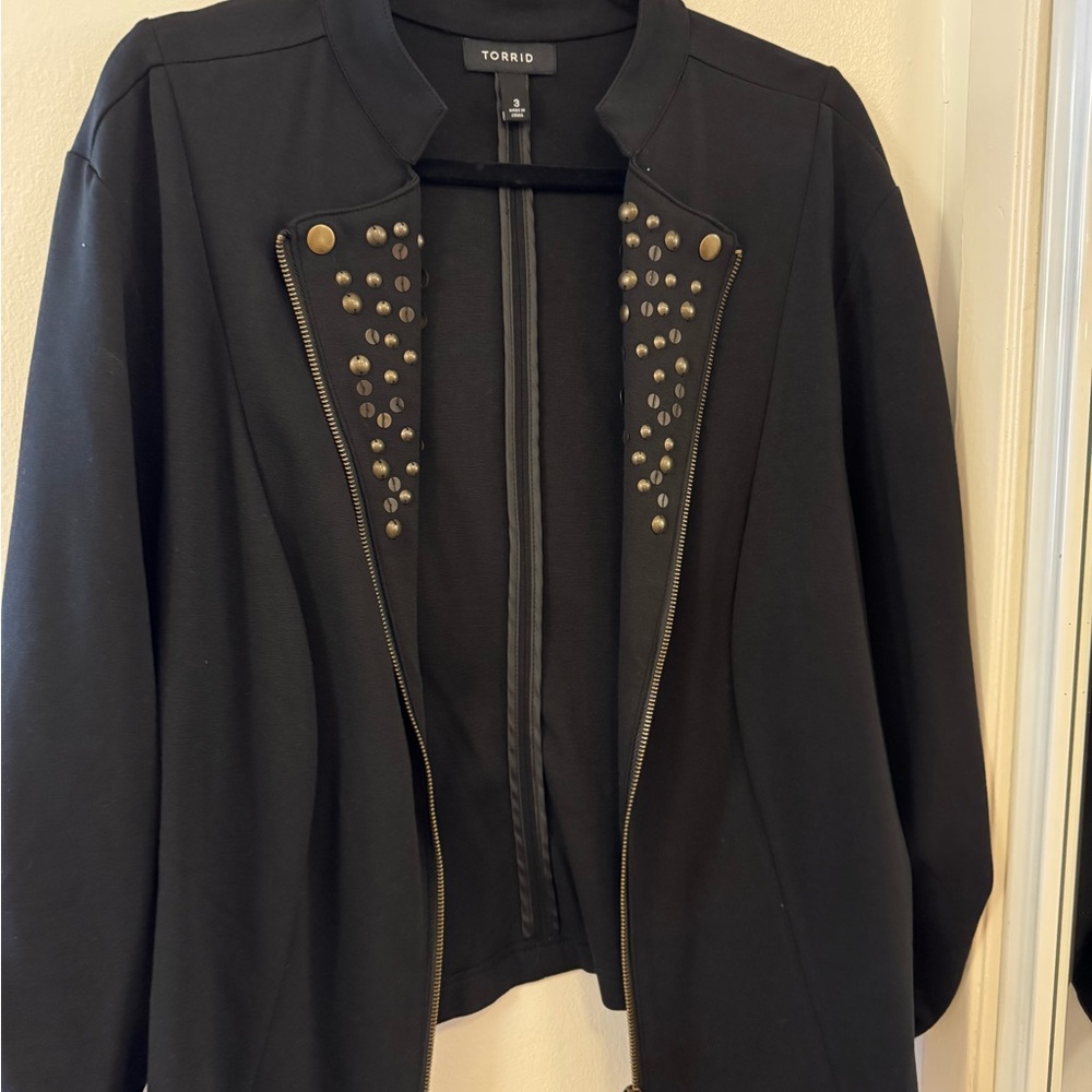 Really cool and edgy black jacket with studs and metal zipper